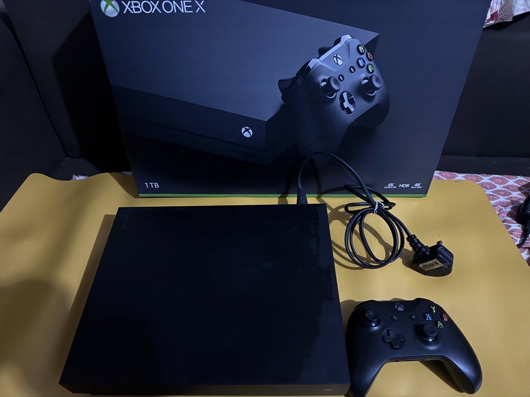 XBOX ONE X - 1TB (Category: Xbox) located in Manila. Submitted by vastfalcon_8c1398 (Listing ID 1470720863, Image 1). Description: Selling my Xbox One X with 1TB storage!.