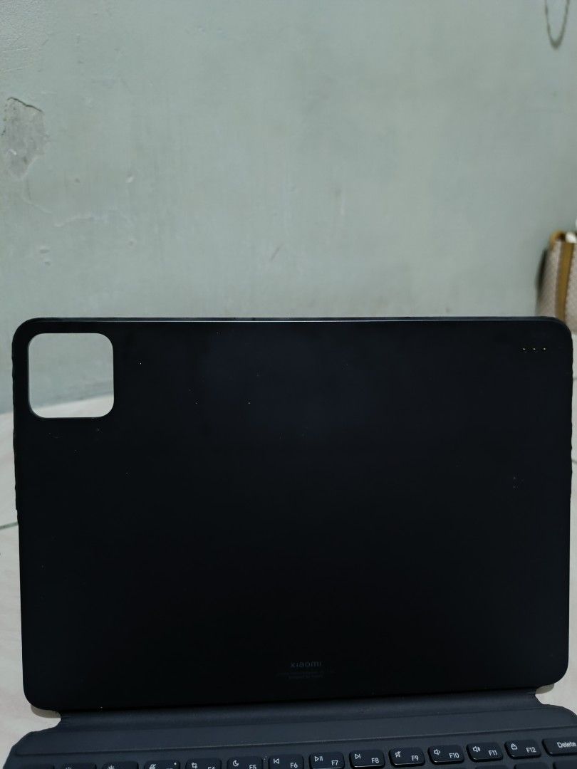 Xiaomi Pad Keyboard Case with Trackpad (Category: Computer Keyboard) located in Manila. Submitted by nothingtosay_00 (Listing ID 1470679293, Image 2). Description: - Compatible with Xiaomi tablet (check model for fit) - Built-in trackpad with standard QWERTY layout - Magnetic fold design protects both screen and back - Convenient camera cutout for the rear camera module - Condition: Shows slight scuffs on the outer cover, otherwise in good workin