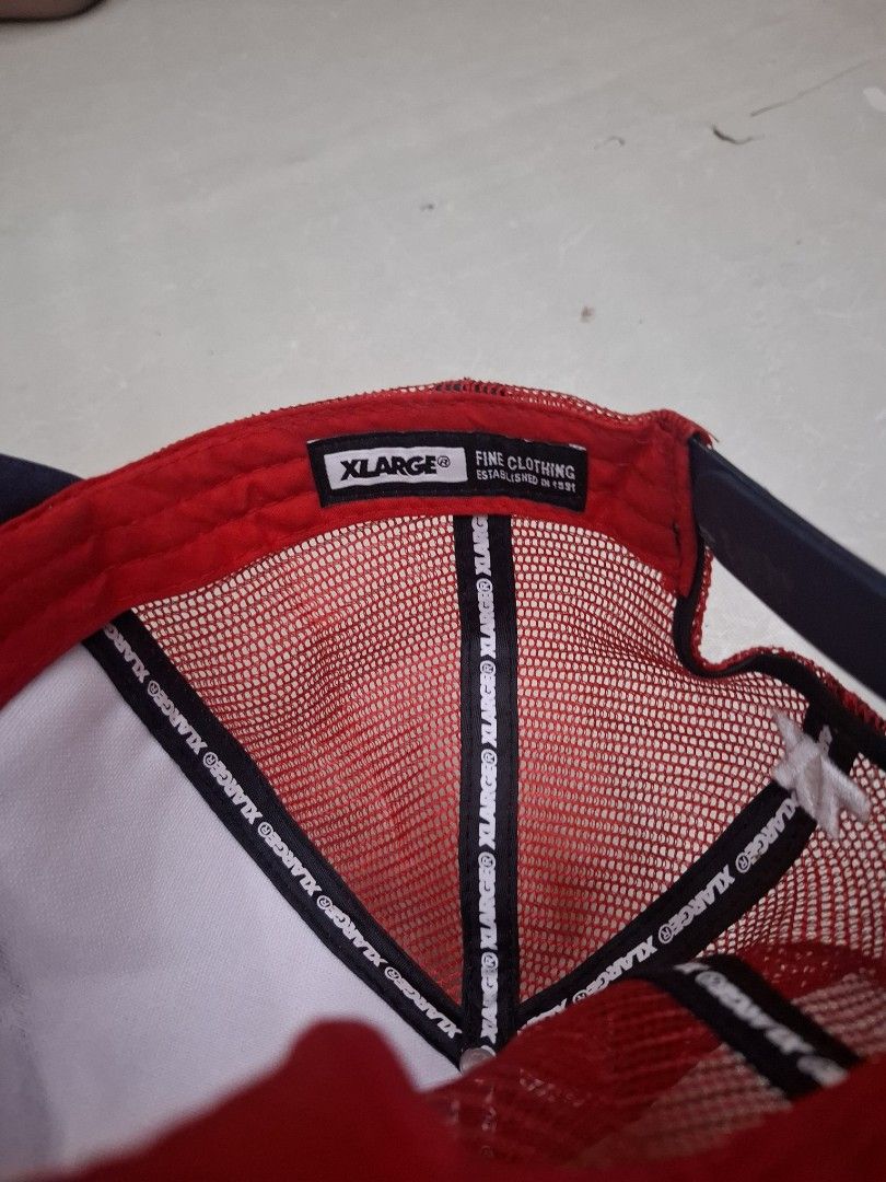 X-Large Trucker Hat Red White Blue Gorilla Logo (Category: Caps & Hats) located in Pasay City. Submitted by al1son18 (Listing ID 1470696915, Image 3). Description: - Size: X-Large with adjustable snapback closure - Design: Iconic gorilla logo with 'Los Angeles California' text on front - Colors: White front panel, dark blue curved brim and top button - Breathability: Red mesh back for all-day comfort.