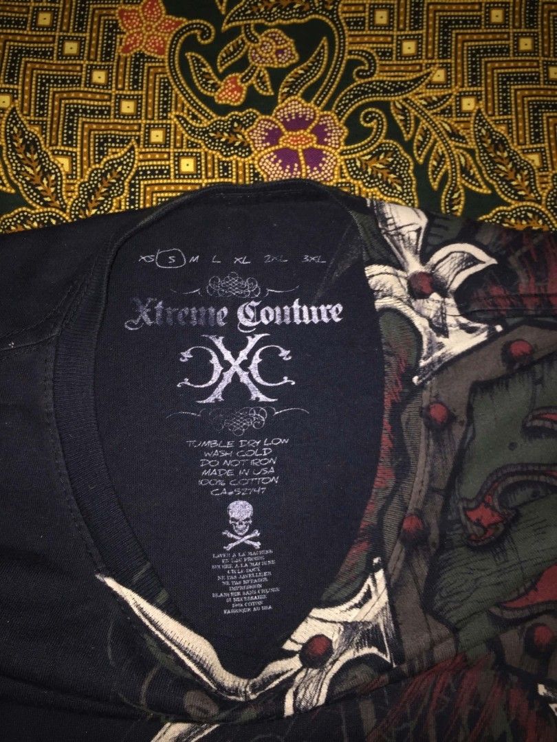 Xtreme Couture Dagger (Category: Tshirts & Polo Shirts ) located in Naga. Submitted by retardcurator (Listing ID 1470574229, Image 2). Description: 19x29 DM for more details..