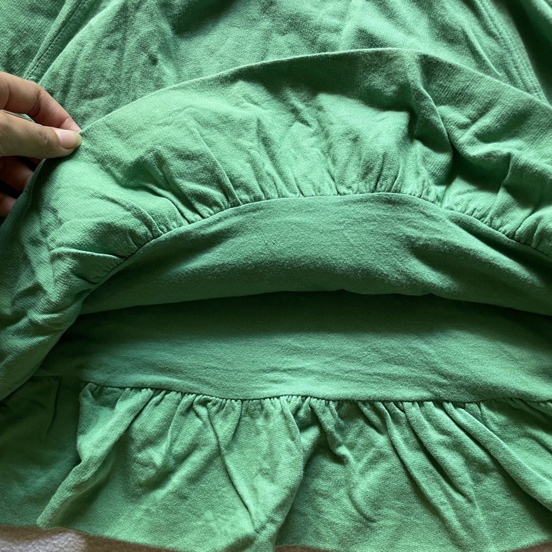 H&M Green Ruffle Drawstring Mini Skirt with Cargo Pockets (Category: Skirts) located in San Quintin. Submitted by polasolah (Listing ID 1470705378, Image 3). Description: wash before use size: 36 on tag, around 30-31 on measuring tape pero ADJUSTABLE naman for smaller waist #hmskirt, #greenskirt, #ruffleskirt, #y2kfashion Y2K / Fairycore / Casual Sporty Mini Skirt good condition .