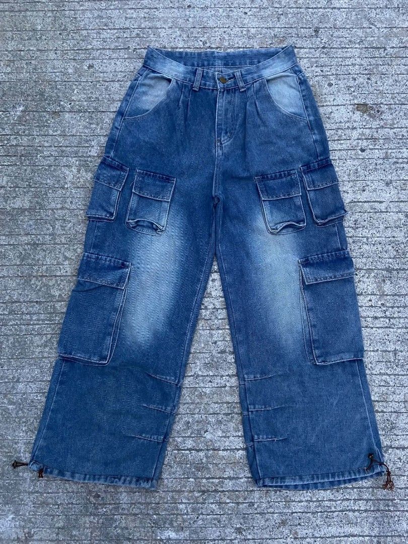 Y2K Multiple Pocket Cargo Baggy Pants (Category: Jeans) located in Lianga. Submitted by arwthrifts (Listing ID 1470667240, Image 1). Description: Multiple Pocket Cargo Baggy Pants dimes: 29-30 Waistline 40 Length 13 thigh 11.5 hem.