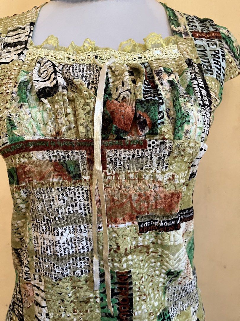 ✨Y2K Newspaper Print Corset-Style Top✨ (Category: Others Tops) located in Lupon. Submitted by weilclstle (Listing ID 1470650615, Image 2). Description: Seller’s Reminder °~ payment first °~ manage your expectations as these clothes are thrifted °~ shipping fee will be shoulder by the buyer °~ issues will be stated if there’s any °~ wash before wearing ~ can request a video of the item ~ 🎀 Mode of Payment : Gcash ✮⋆˙ 🎀 Mode of Delivery : Jnt ✮⋆˙