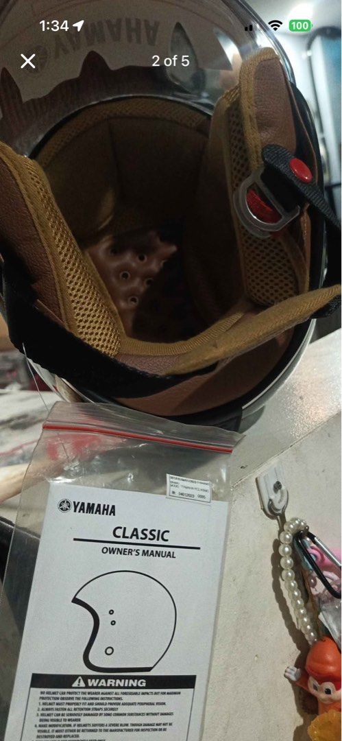 Yamaha Classic Helmet White with Visor (Category: Helmets and other Riding Gears) located in Manila. Submitted by sheinevida (Listing ID 1470722393, Image 3). Description: medium size vintage look - Brand: Yamaha Classic - Color: Glossy white with stylish brown inner padding and mesh details - Condition: Brand new, never used, with original tag still on the visor - Visor: Clear visor with original protective sticker and warning labels intact - In