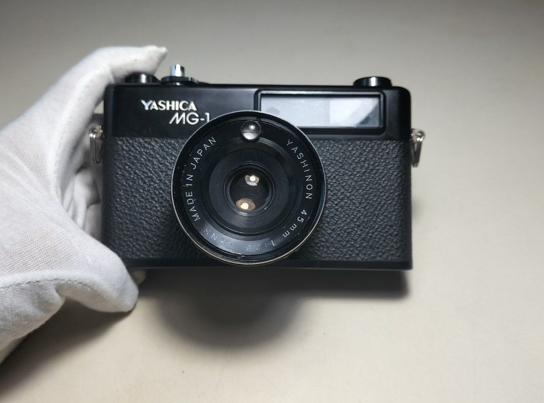 Yashica MG-1 Rangefinder Film Camera (Category: Cameras) located in Paranaque City. Submitted by zenfalcon.e8286d (Listing ID 1470567953, Image 1). Description: Ready to use... -Good working condition -Clad recently -Clean lens&VF/RFpatch- ok -Exposure: Auto Aperture priority(Accurate) -Slow/Over signal (works) -Working timer -Has light seals -Comes with battery and adapter,generic lenscap and strap - Presentable... .