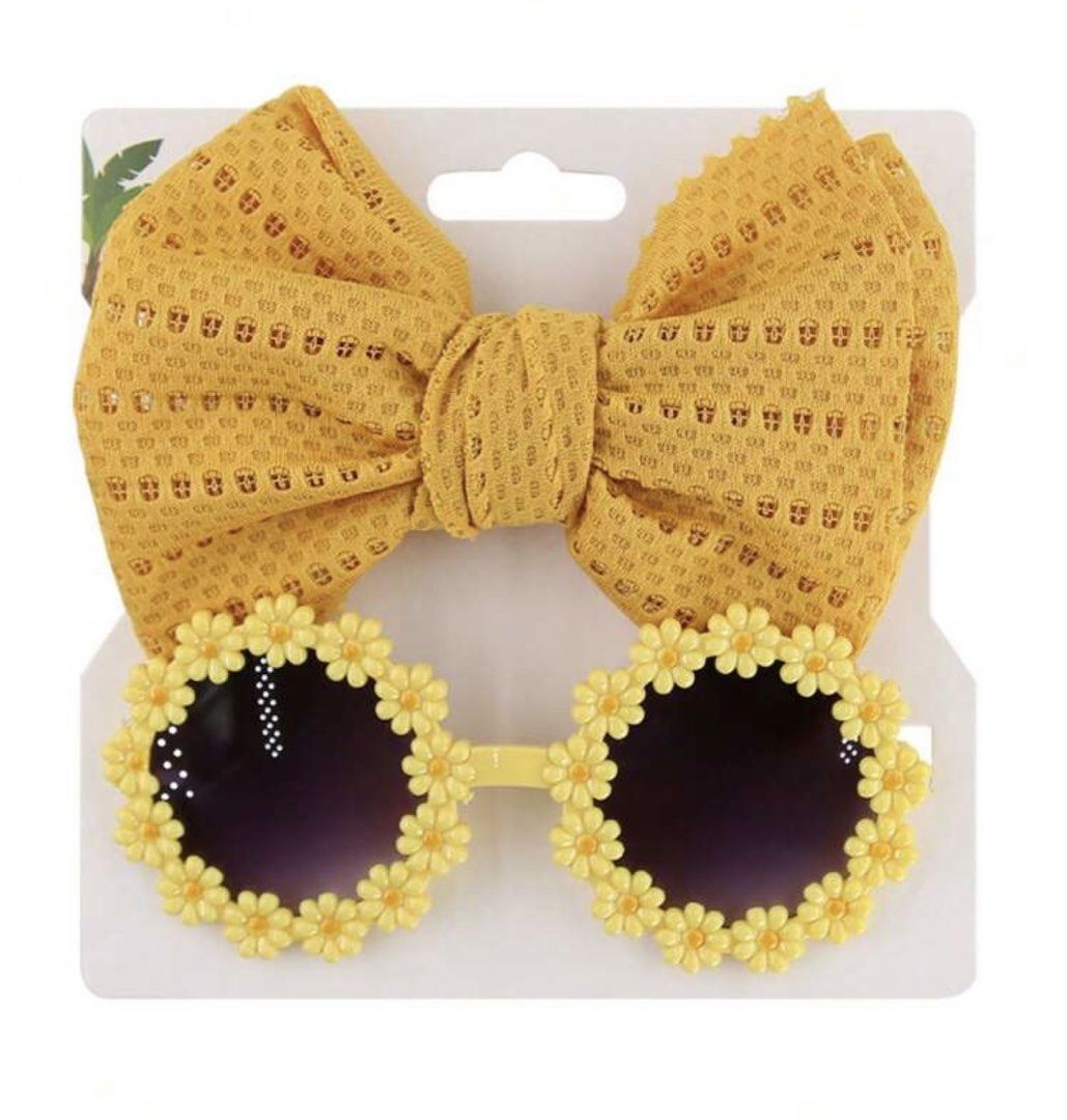 Yellow Flower Sunglasses and Matching Bow Set (Category: Babies & Kids Fashion) located in Manila. Submitted by clothingbyarnie (Listing ID 1470614510, Image 1). Description: - Kids bright yellow flower-shaped sunglasses with matching mesh bow - Fun and playful accessory set for sunny days, outings, or parties - Comes on a white display card - Brand new and unused condition, properly stored.