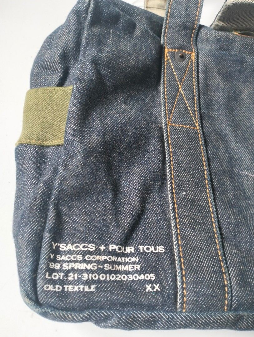 Yoji × y'saccs × pour tous (Category: Luxury Bags & Wallets) located in Baguio. Submitted by dapper_deals (Listing ID 1470666864, Image 2). Description: -yoji y'saccs + pour tous denim tote or hand bag -From 1999 spring summer collection -Feature a stylish stripe interrior lining -Includes a convenient small inner pocket -Durable handles with comfortable tan fabric backing -Ideal for everyday wear and tear -Check photos for detailed label informa