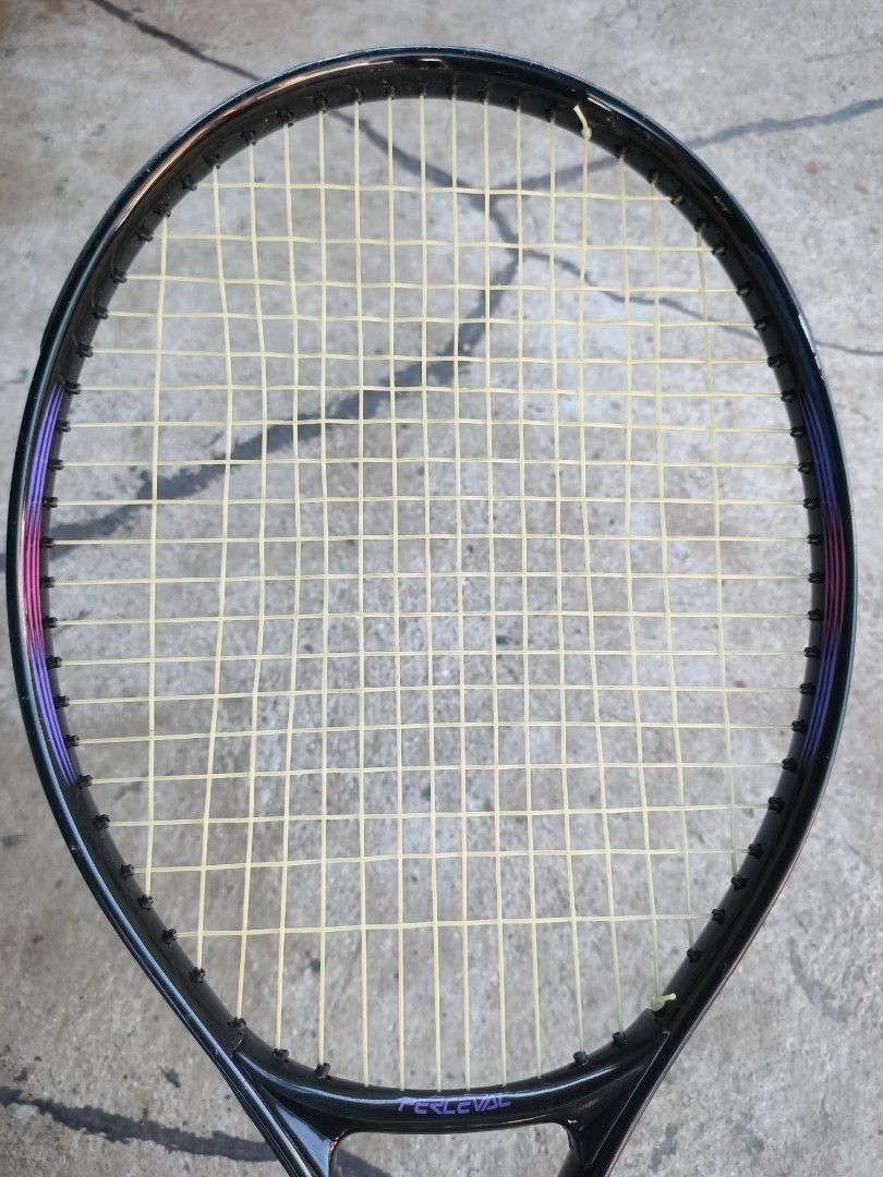 Yonex Nanoray 70DX Badminton Racket (Category: Racket and Ball Sports) located in Taguig. Submitted by grandfish_55ab5c (Listing ID 1470566939, Image 3). Description: - Brand/Model: Yonex Nanoray 70DX - Color: Black and Green - Condition: Strung and ready to play, with normal wear on the frame from regular court use; grip tape needs replacing soon - Skill Level: Ideal for intermediate players - Key Features: Delivers reliable speed and control.