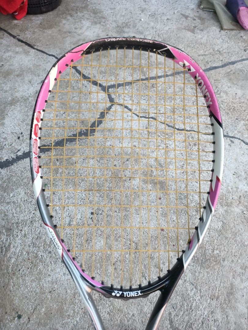 Yonex Nanoray 70DX Badminton Racket (Category: Racket and Ball Sports) located in Taguig. Submitted by grandfish_55ab5c (Listing ID 1470566939, Image 2). Description: - Brand/Model: Yonex Nanoray 70DX - Color: Black and Green - Condition: Strung and ready to play, with normal wear on the frame from regular court use; grip tape needs replacing soon - Skill Level: Ideal for intermediate players - Key Features: Delivers reliable speed and control.