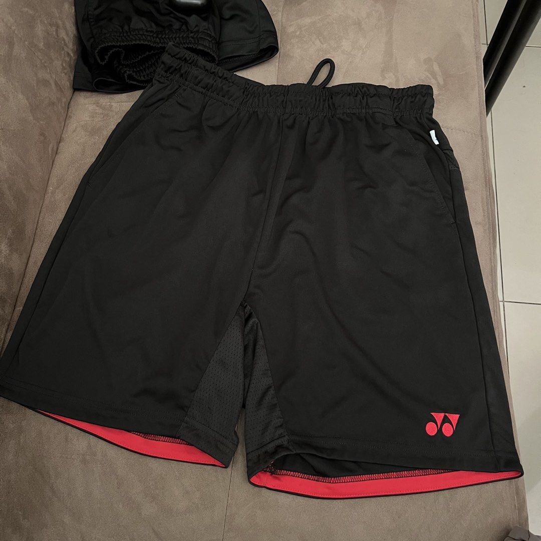 Yonex trubreeze Black & Red (Category: Activewear) located in Manila. Submitted by coolcloud_9e66fe (Listing ID 1470611376, Image 1). Description: RFS: Wrong size original price ₱1,600 selling for only - ₱800 - Brand: Yonex - Color: Black with vibrant pink accents and logo - Waist: Elastic with adjustable drawstring (approx. 35 cm flat lay) - Length: Approx. 48 cm total, 29 cm inseam - Features: Breathable mesh inner leg panels and dual side pock