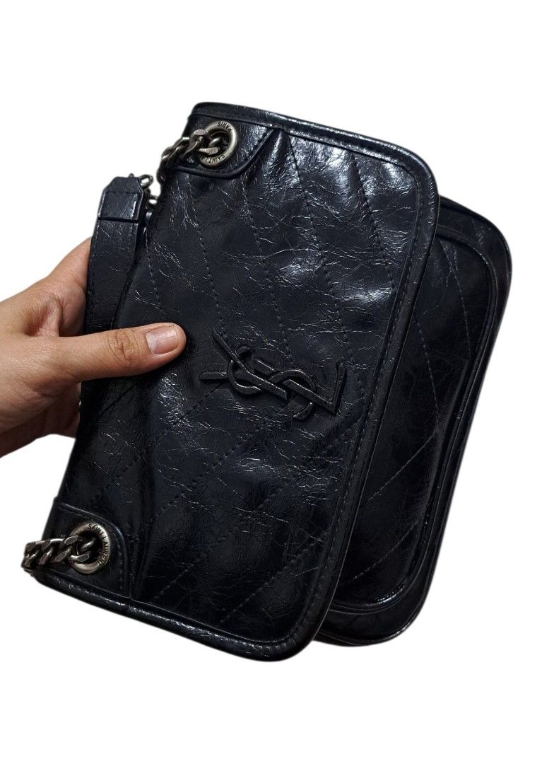 YSL Shoulder Bag (Category: Shoulder Bags) located in Quezon City. Submitted by kirstenbella (Listing ID 1470644164, Image 2). Description: YSL Niki Shoulder Bag in black quilted vintage crinkled calfskin leather. - Black quilted vintage crinkled calfskin leather with chevron quilting - Matching black finish with iconic YSL monogram - Dual chain & leather straps plus a convenient top handle - Magnetic snap front flap - Fabric-lined interior with 