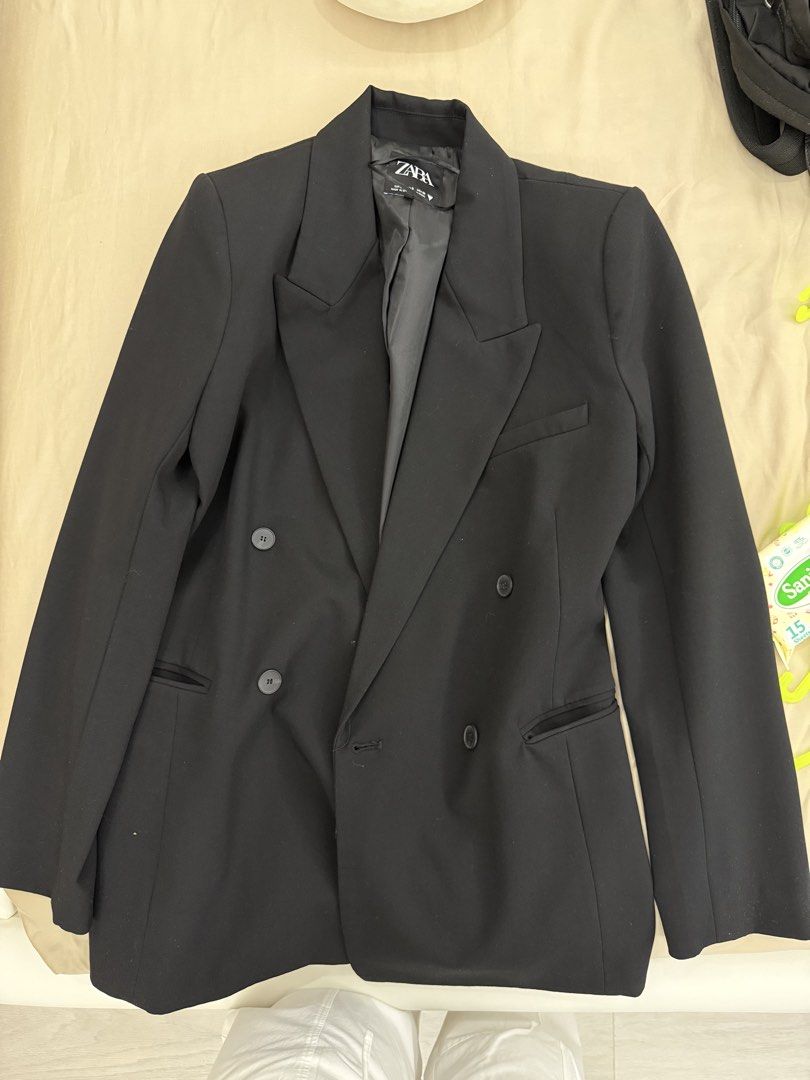 Zara Black Double Breasted Blazer Size S (Category: Coats, Jackets and Outerwear) located in Manila. Submitted by nicccsalva (Listing ID 1470684497, Image 3). Description: - Brand: Zara - Size: S - Color: Black - Style: Double-breasted blazer with classic lapel collar and structured shoulders - Details: Fully lined, front button closures, clean look - Condition/Vibe: Versatile wardrobe staple, easy to style for both work and casual wear.