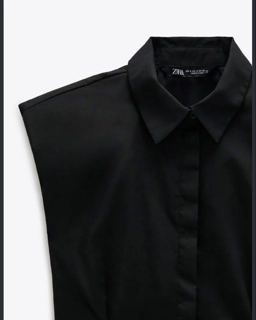 Zara black poplin cropped button-down top (Category: Blouses) located in Davao. Submitted by theresetshelf (Listing ID 1470613969, Image 1). Description: • 100% Cotton / Poplin material • Sleeveless / cap-sleeve style • Flattering cropped length • Clean, minimalist vibe .