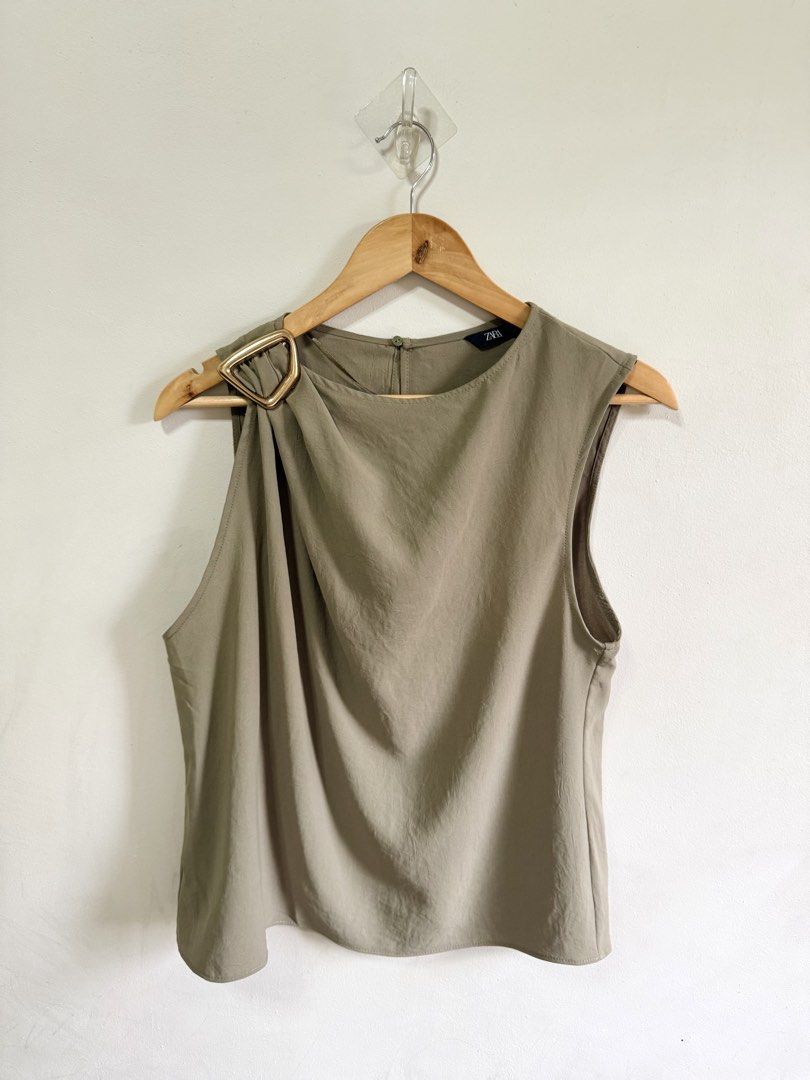 Zara buckled top (Category: Longsleeves) located in Tarlac. Submitted by giannisdeclutters4106 (Listing ID 1470561837, Image 1). Description: Good as new Large on tag Fits medium to large So pretty!.