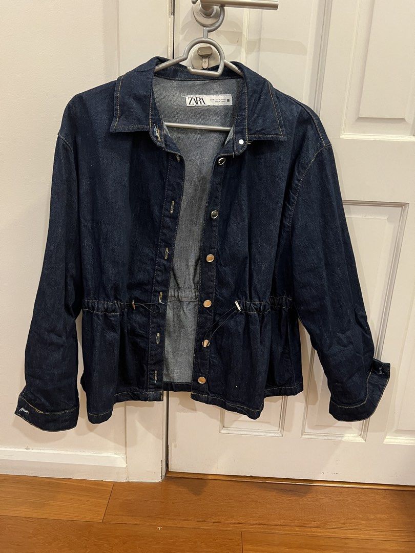 Zara Dark Blue Denim Jacket with Drawstring Waist (Category: Coats, Jackets and Outerwear) located in San Juan City. Submitted by thrillfinder (Listing ID 1470574938, Image 2). Description: - Brand: Zara - Size: EUR L / USA L / MEX 30 - Color: Dark blue wash with contrast stitching - Material: Quality denim, made in Turkey - Features: Button-up front with metallic buttons, classic collar, long sleeves with buttoned cuffs - Fit: Adjustable drawstr