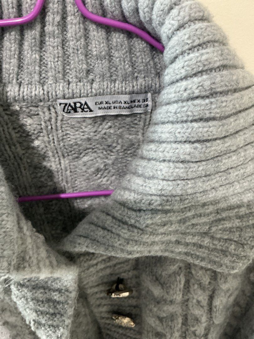 Zara Grey Cable Knit Collared Cardigan Size XL (Category: Coats, Jackets and Outerwear) located in Rizal. Submitted by kyliemaine (Listing ID 1470626190, Image 2). Description: - Brand: Zara - Size: XL - Color: Grey - Material: Thick cable knit, ideal for cold weather - Details: Oversized collar, shiny decorative buttons, ribbed cuffs and hem - Origin: Made in Bangladesh - Condition: Clean overall.