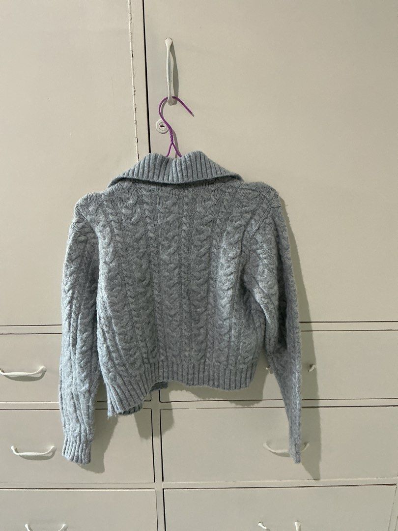 Zara Grey Cable Knit Collared Cardigan Size XL (Category: Coats, Jackets and Outerwear) located in Rizal. Submitted by kyliemaine (Listing ID 1470626190, Image 3). Description: - Brand: Zara - Size: XL - Color: Grey - Material: Thick cable knit, ideal for cold weather - Details: Oversized collar, shiny decorative buttons, ribbed cuffs and hem - Origin: Made in Bangladesh - Condition: Clean overall.