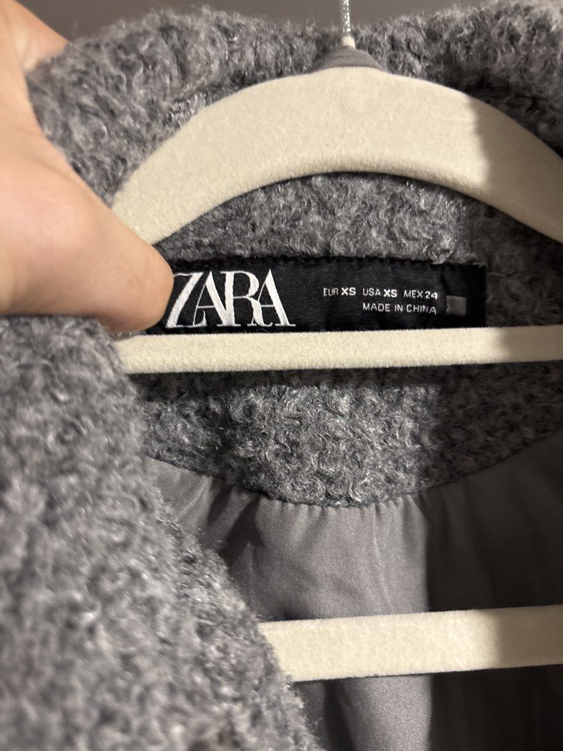 Zara Grey Textured Cropped Zip Jacket XS (Category: Coats, Jackets and Outerwear) located in Tarlac. Submitted by somethinboutgyu (Listing ID 1470672468, Image 2). Description: - Brand: Zara - Size: XS - Color: Grey - Material/Texture: Textured outer with fully lined interior - Closure: Full front zipper with collar - Pockets: Two front chest pockets with snap button flaps - Condition: Great cropped outerwear for cooler days.