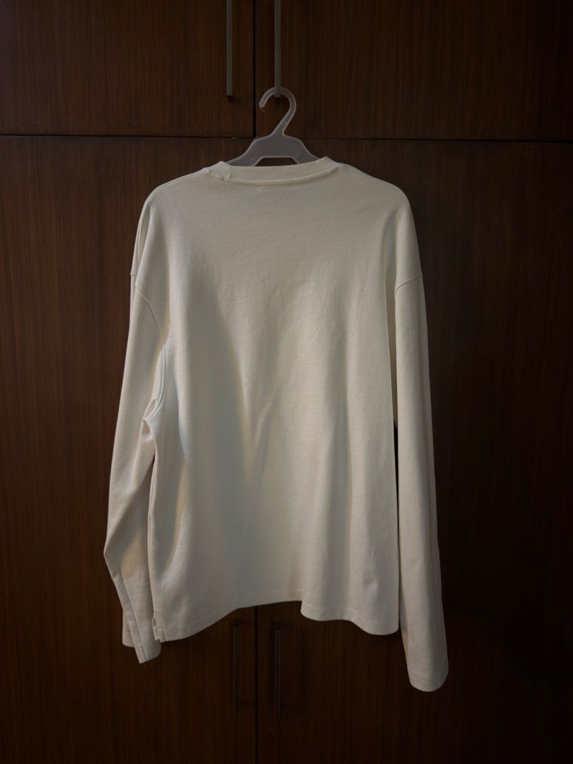 Zara Uncommon Aesthetic Long Sleeve Tee (Category: Tshirts & Polo Shirts ) located in Manila. Submitted by preloved123. (Listing ID 1470713796, Image 2). Description: - Brand: Zara - Color: Cream/White - Size: L - Material/Origin: Made in Bangladesh - Design: 'Uncommon Aesthetic' print on left chest, clean solid back - Fit: Relaxed fit with crew neck.