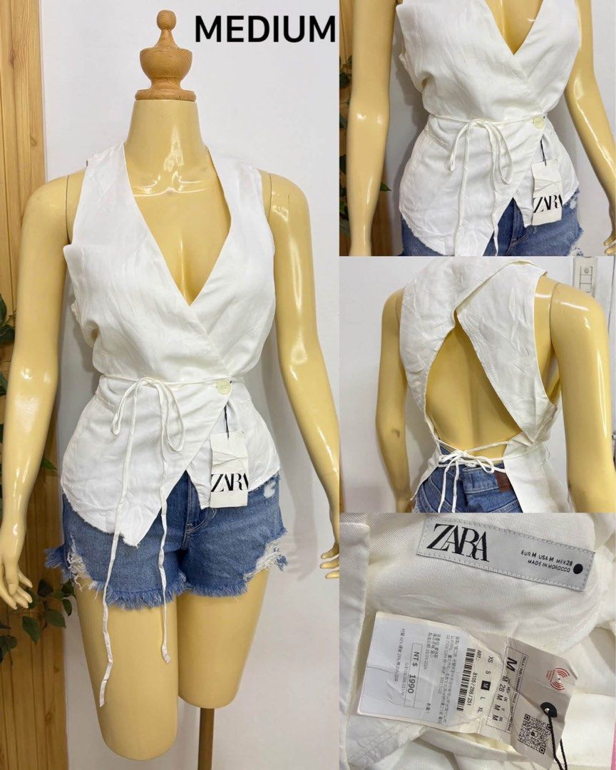 Zara White Wrap Tie Backless Top Size Medium (Category: Sleeveless) located in Tagum. Submitted by bernardino49694 (Listing ID 1470586829, Image 1). Description: - Brand: Zara - Condition: Brand new with tags (BNWT) - Size: Medium - Color: White - Material: Light, breathable fabric (Made in Morocco) - Design: Sleeveless wrap top, deep V-neckline, side tie closure - Back: Open back design with adjustable tie strings.