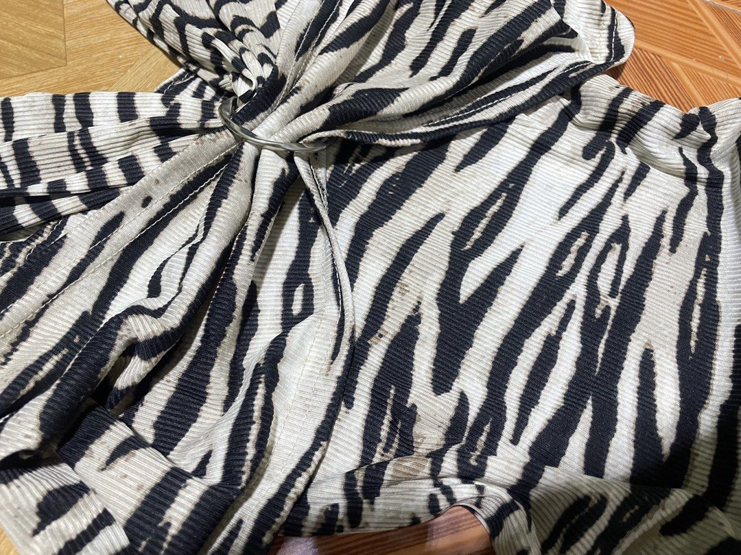 zebra print off-shoulder top (Category: Others Tops) located in Taguig. Submitted by chichoneyy (Listing ID 1470654065, Image 2). Description: black-and-white zebra print top with an off-the-shoulder neckline, short sleeves, and a twisted draped bust detail with a flattering V-neck strap design. ♡ stylish and easy to pair with skirts, jeans, or shorts ♡ perfect for casual fits and going-out looks ♡ reference: xs, but GOOD for both for s-xs sized 