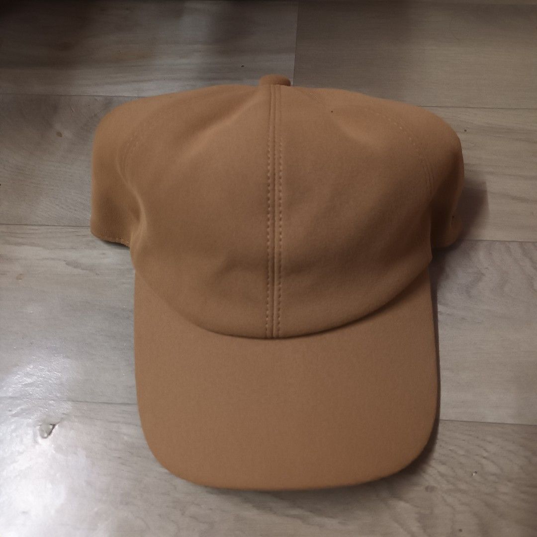 Zegna Zephyr Tan Suede Baseball Cap (Category: Caps & Hats) located in Manila. Submitted by itsnik444 (Listing ID 1470603815, Image 3). Description: - Brand: Zegna Zephyr - Material: Premium tan suede with grey inner lining and brown band - Details: Metal Zegna logo plaque on the side panel - Design: Clean shape, curved brim - Condition: Excellent, well-maintained - Style: Versatile neutral tone, great for casual everyday wear.
