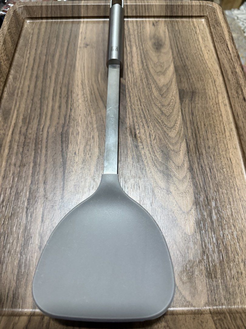 Zwilling Silicone Kitchen Spatula 42MD10 (Category: Cookware & Accessories) located in Digos. Submitted by old_soul. (Listing ID 1470694958, Image 1). Description: - Brand: Zwilling - Model: 42MD10 - Material: Stainless steel handle with durable grey silicone spatula head - Features iconic Zwilling twin logo engraved on the handle - Gentle on non-stick pans, pots, and bakeware - Heat-resistant and easy to clean - Condition: Well-maintained and re