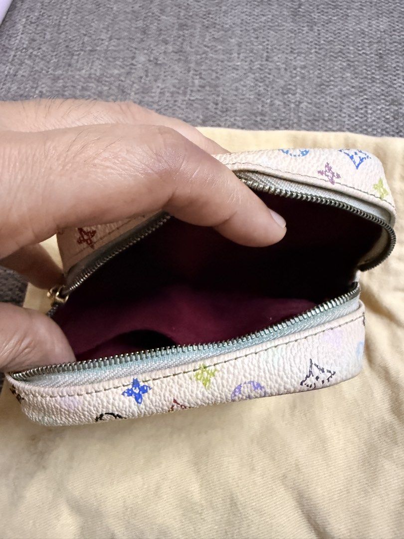 1990-2010 Monogram Multicolor Trousse Wapity clutch bag (Category: Purses & Pouches) located in Marikina City. Submitted by anndergroundmarket (Listing ID 1470773081, Image 2). Description: Highlights multicolor canvas body vachetta leather wrist handle top zip closure interior slip pocket white Condition: Heavily Used. This previously owned and used item has heavily signs of use. This may include fading of material or plating and scratches. Plea