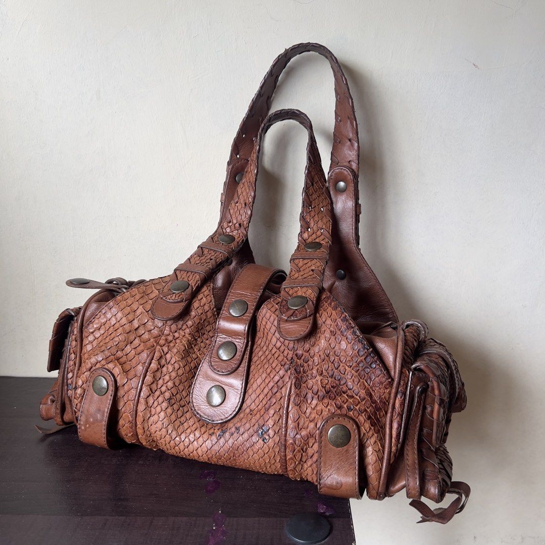 2006 Chloe Python Silverado Shoulder Bag (Brown) | vintage (Category: Luxury Bags & Wallets) located in Caloocan City. Submitted by vintageangelxx (Listing ID 1470810590, Image 2). Description: - In great vintage condition (Rank AB) - Flaws: general signs of usage, some dryness on the corner scales, marks on interior. - Won’t be responding to lowballers. Overall, bag is still very fab and presentable. I’m either listing this for showcasing purpos