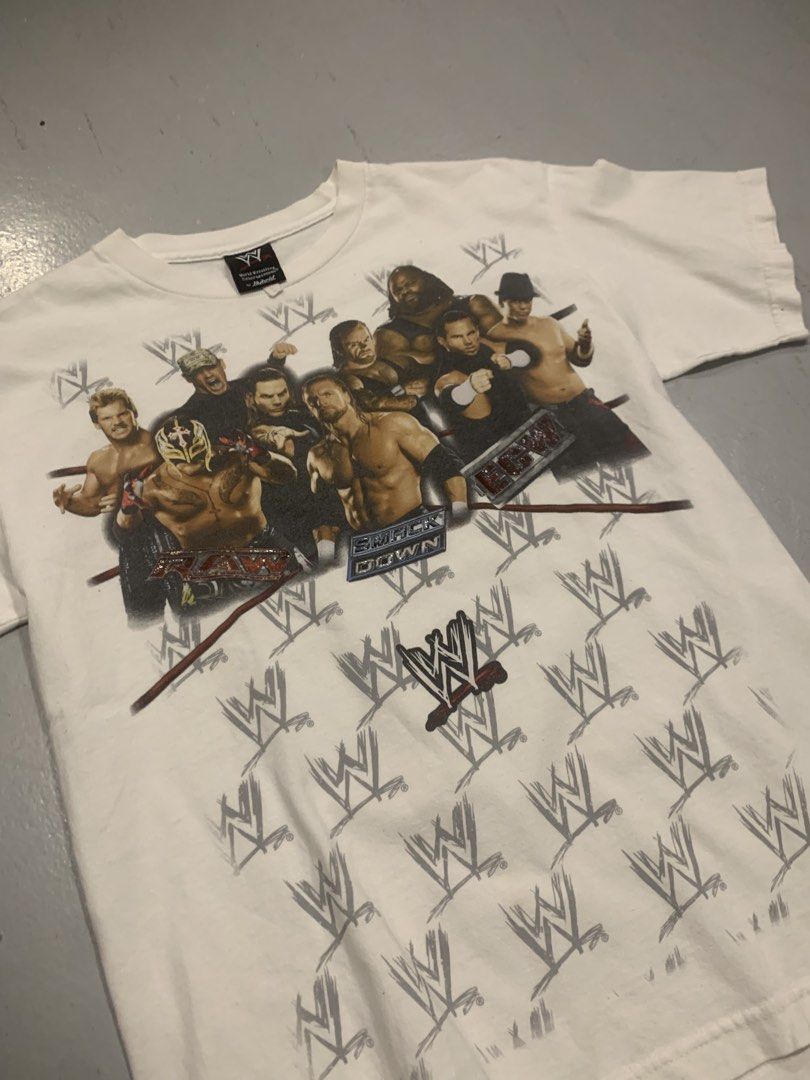 2007 Smack down ECW Raw wrestling shirt (Category: Tshirts & Polo Shirts ) located in Las Pinas. Submitted by thevintagejunkiemanila (Listing ID 1470828276, Image 1). Description: 2007 Smackdown Raw ECW roster shirt by Hybrid . Size: fits M Length: 26.5 Width: 19.5 . Php 1800.