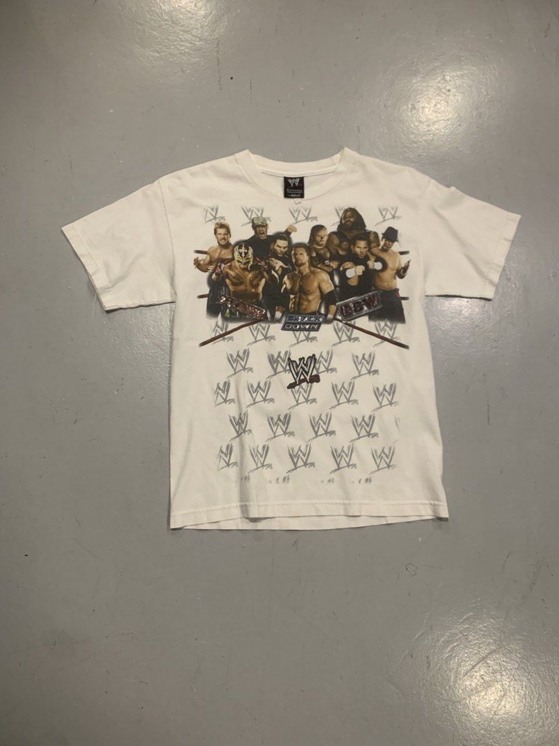 2007 Smack down ECW Raw wrestling shirt (Category: Tshirts & Polo Shirts ) located in Las Pinas. Submitted by thevintagejunkiemanila (Listing ID 1470828276, Image 2). Description: 2007 Smackdown Raw ECW roster shirt by Hybrid . Size: fits M Length: 26.5 Width: 19.5 . Php 1800.