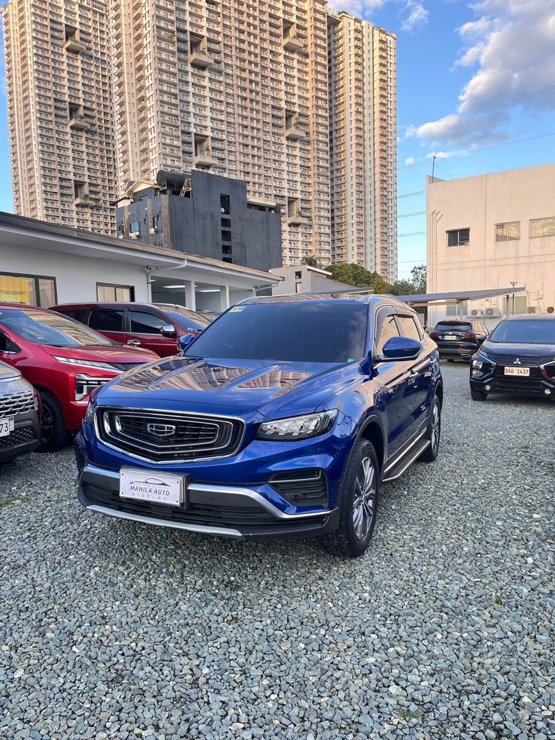 2022 Geely Azkarra Luxury (Category: Used Cars) located in Pasig City. Submitted by mad_cars (Listing ID 1470753627, Image 3). Description: 2022 GEELY AZKARRA LUXURY GAS AUTOMATIC TRANSMISSION ₱538,000 (AVAILABLE FOR FINANCING ZERO PERCENT PROCESSING FEE UNTIL Blue 79Tkms mileage Automatic Transmission 1.5L Gasoline Engine 0 ending plate Push Start Engine Address: Elements Rosemarie Pasig Boulevard, Brgy Kapitolyo Pasig. Googlemap or Waze: Elemen