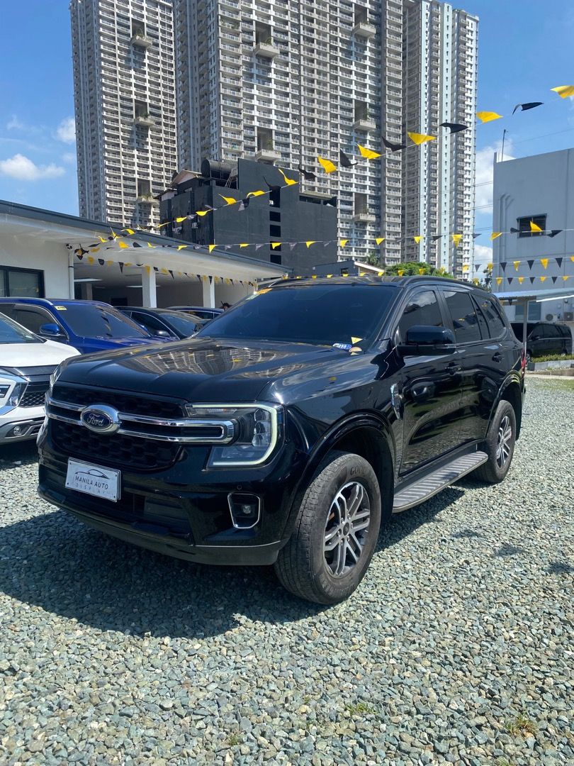 2023 Ford Everest Limited (Category: Used Cars) located in Pasig City. Submitted by mad_cars (Listing ID 1470804842, Image 3). Description: 2023 FORD EVEREST LIMITED 2.0L DSL AUTOMATIC TRANSMISSION ₱1,275,000 (AVAILABLE FOR FINANCING ZERO PERCENT PROCESSING FEE UNTIL) Keyless Absolute Black 42tkms mileage 5 ending plate 2.0L Diesel Engine Automatic Transmission Address: Elements Rosemarie Pasig Boulevard, Brgy Kapitolyo Pasig. Googlemap or Waze: 