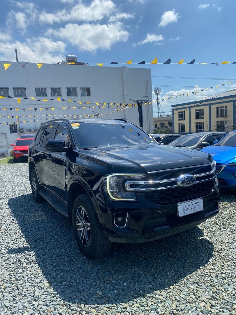2023 Ford Everest Limited (Category: Used Cars) located in Pasig City. Submitted by mad_cars (Listing ID 1470804842, Image 2). Description: 2023 FORD EVEREST LIMITED 2.0L DSL AUTOMATIC TRANSMISSION ₱1,275,000 (AVAILABLE FOR FINANCING ZERO PERCENT PROCESSING FEE UNTIL) Keyless Absolute Black 42tkms mileage 5 ending plate 2.0L Diesel Engine Automatic Transmission Address: Elements Rosemarie Pasig Boulevard, Brgy Kapitolyo Pasig. Googlemap or Waze: 