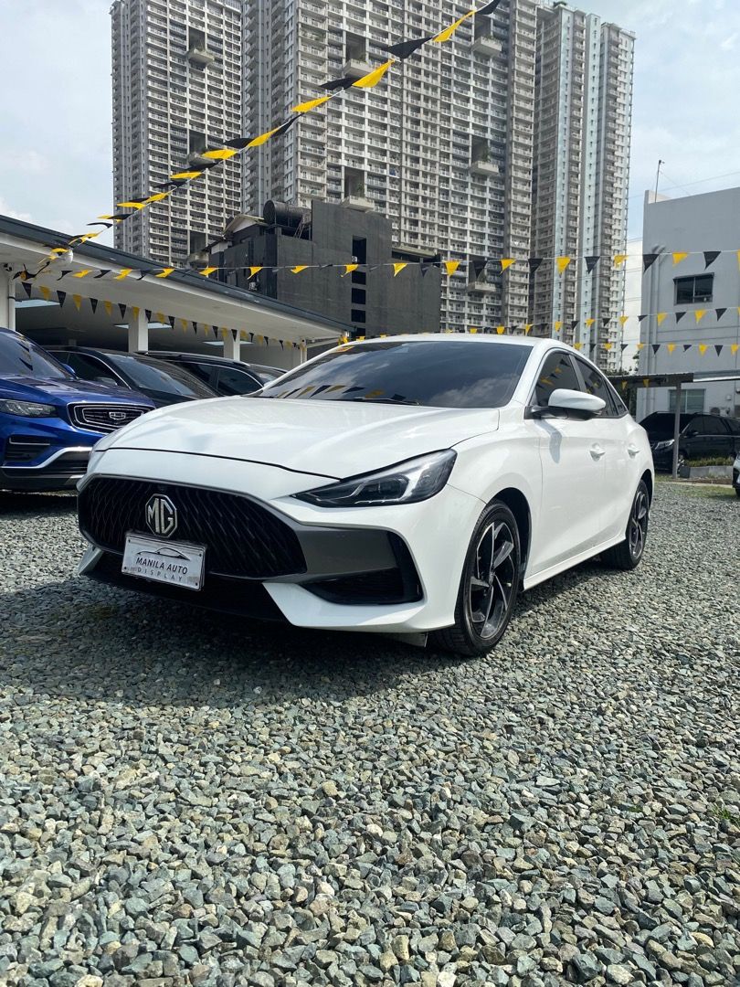 2023 MG GT SPORT (Category: Used Cars) located in Pasig City. Submitted by mad_cars (Listing ID 1470783676, Image 3). Description: 2023 MG GT SPORT 1.5L GAS AUTOMATIC TRANSMISSION ₱499,000 (AVAILABLE FOR FINANCING ZERO PERCENT PROCESSING FEE UNTIL) Moon White 27tkms mileage Automatic Transmission 1.5L Gasoline Engine 2 ending plate LED Headlights Address: Elements Rosemarie Pasig Boulevard, Brgy Kapitolyo Pasig. Googlemap or Waze: Elements Rosema