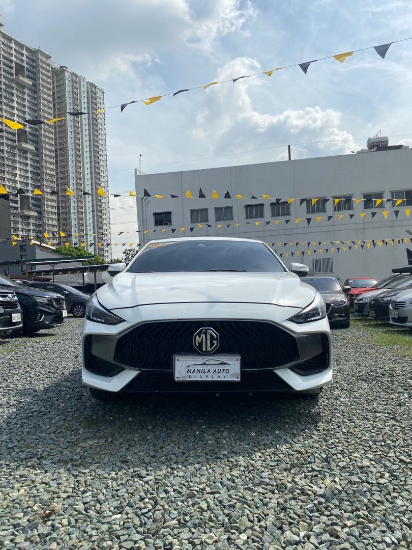 2023 MG GT SPORT (Category: Used Cars) located in Pasig City. Submitted by mad_cars (Listing ID 1470783676, Image 1). Description: 2023 MG GT SPORT 1.5L GAS AUTOMATIC TRANSMISSION ₱499,000 (AVAILABLE FOR FINANCING ZERO PERCENT PROCESSING FEE UNTIL) Moon White 27tkms mileage Automatic Transmission 1.5L Gasoline Engine 2 ending plate LED Headlights Address: Elements Rosemarie Pasig Boulevard, Brgy Kapitolyo Pasig. Googlemap or Waze: Elements Rosema