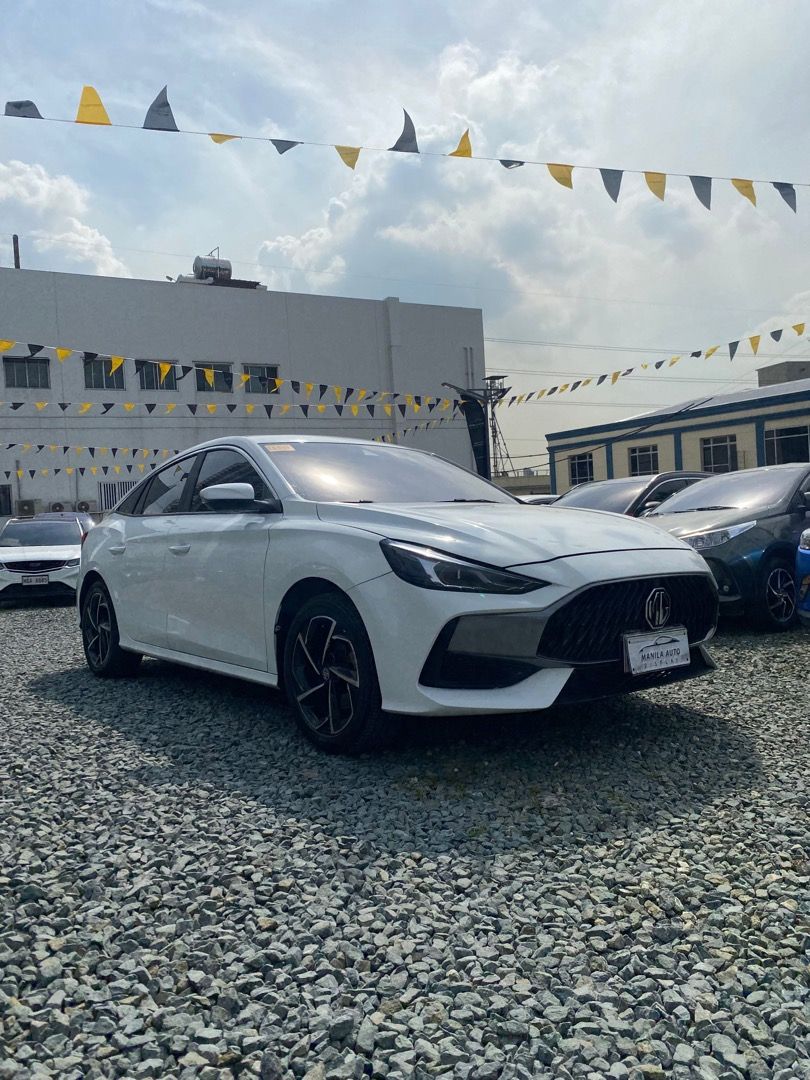 2023 MG GT SPORT (Category: Used Cars) located in Pasig City. Submitted by mad_cars (Listing ID 1470783676, Image 2). Description: 2023 MG GT SPORT 1.5L GAS AUTOMATIC TRANSMISSION ₱499,000 (AVAILABLE FOR FINANCING ZERO PERCENT PROCESSING FEE UNTIL) Moon White 27tkms mileage Automatic Transmission 1.5L Gasoline Engine 2 ending plate LED Headlights Address: Elements Rosemarie Pasig Boulevard, Brgy Kapitolyo Pasig. Googlemap or Waze: Elements Rosema
