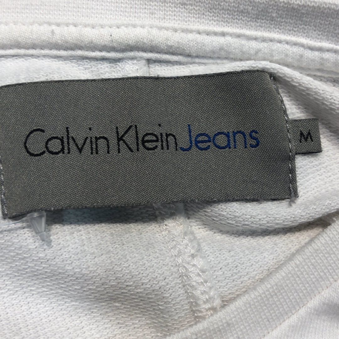 267009991 CALVIN KLEIN CLOTHES TSHIRT SIZE M (Category: Tshirts & Polo Shirts ) located in Taguig. Submitted by ecoring.ph (Listing ID 1470757795, Image 3). Description: ◆CONDITION: B- ◆DESCRIPTIONS: (Other defects/info:) The body of the shirt has minimal stains, dirt, and minor discoloration, and shows signs of use. * SIZE: ◆SHOULDER TO SHOULDER: 16inches. (approximately only) ◆BUST: 42inches. (approximately only) ◆ LENGTH: 26inches. (approximat