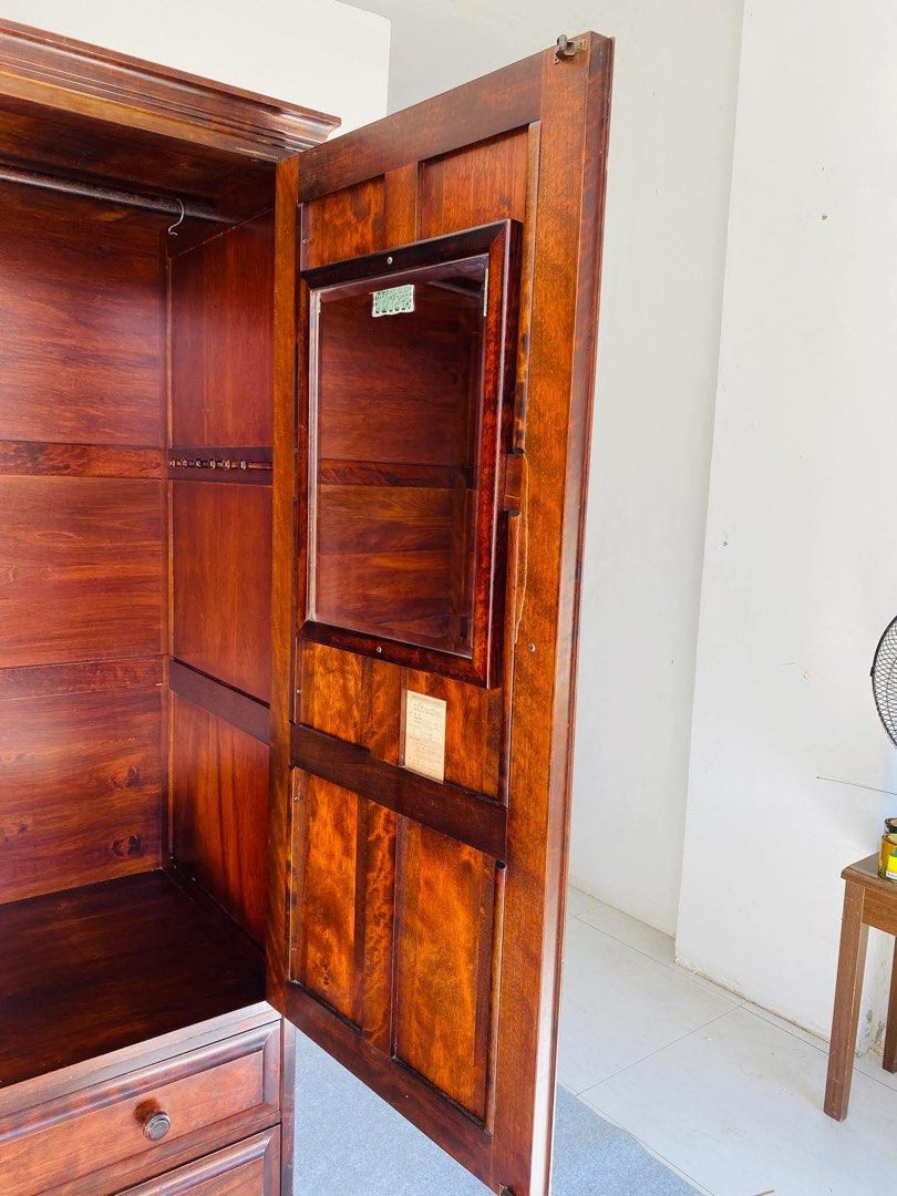 2 Door Wardrobe/Closet with 2 Pullout Drawers (Category: Shelves, Cabinets & Racks) located in Manila. Submitted by justinlei.103 (Listing ID 1470924791, Image 3). Description: “JAPAN SURPLUS” 2-DOOR ROSEWOOD CLOSET / WARDROBE WITH 2 PULL OUT DRAWERS SIZE: 48L” x 24W” x 73H” inches (AS-IS ITEM) IN GOOD CONDITION.