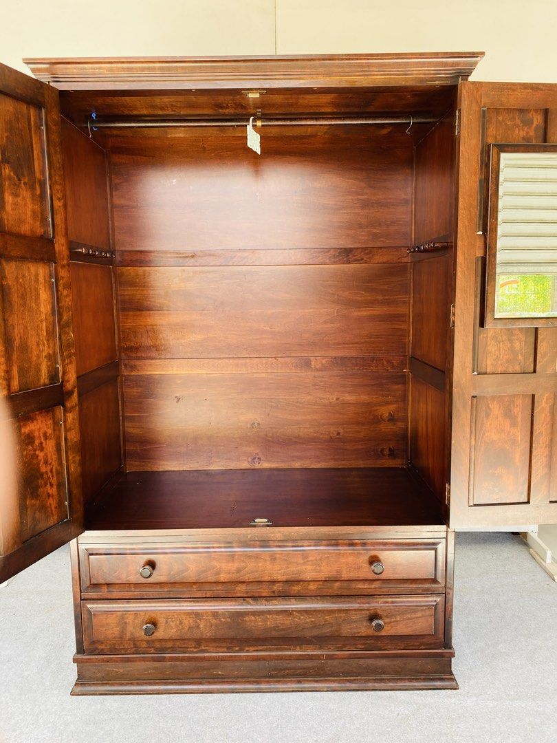 2-Door Rosewood Wardrobe / Closet (Category: Shelves, Cabinets & Racks) located in Manila. Submitted by elliefurnies31 (Listing ID 1470863872, Image 3). Description: "JAPAN SURPLUS" 2-DOOR ROSEWOOD CLOSET / WARDROBE WITH 2 PULL OUT DRAWERS SIZE: 48L" x 24W" x 73H" inches (AS-IS ITEM) IN GOOD CONDITION.