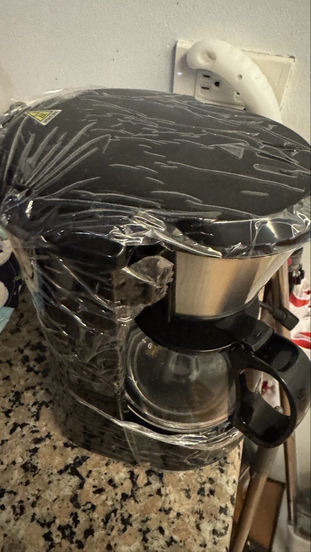 3D drip coffee maker with glass carafe (Category: Coffee Machines & Makers) located in Caloocan City. Submitted by corrinejoy03482 (Listing ID 1470928943, Image 3). Description: - Brand new, still wrapped in original protective plastic - Sleek black design with a durable glass carafe - Includes stainless steel filter basket, filter holder, and main body unit - Simple and easy to use for your daily coffee brewing - Ready for meetup/pickup or quick