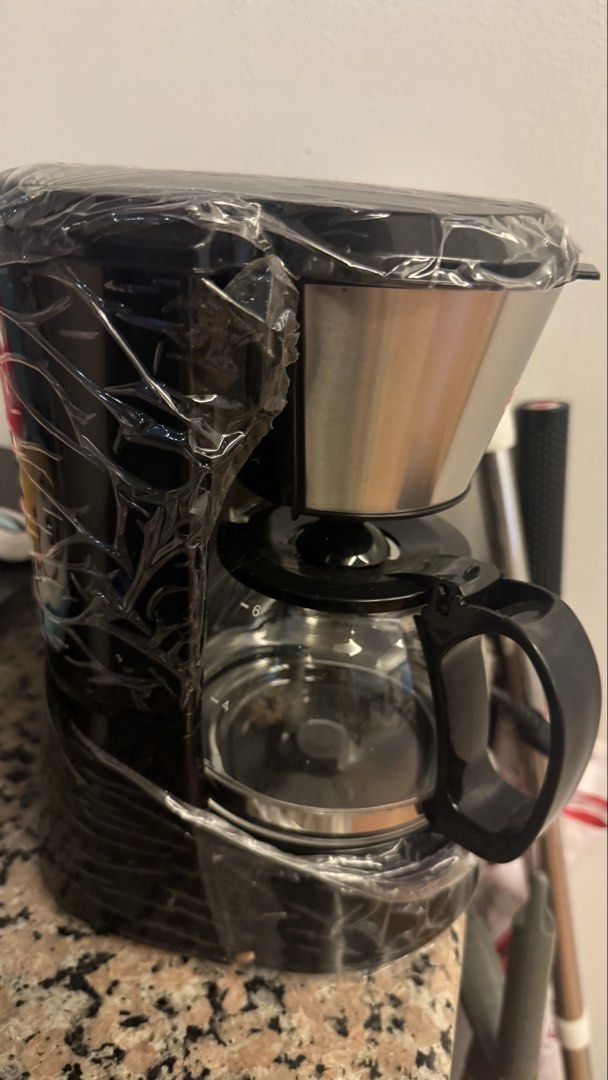 3D drip coffee maker with glass carafe (Category: Coffee Machines & Makers) located in Caloocan City. Submitted by corrinejoy03482 (Listing ID 1470928943, Image 2). Description: - Brand new, still wrapped in original protective plastic - Sleek black design with a durable glass carafe - Includes stainless steel filter basket, filter holder, and main body unit - Simple and easy to use for your daily coffee brewing - Ready for meetup/pickup or quick