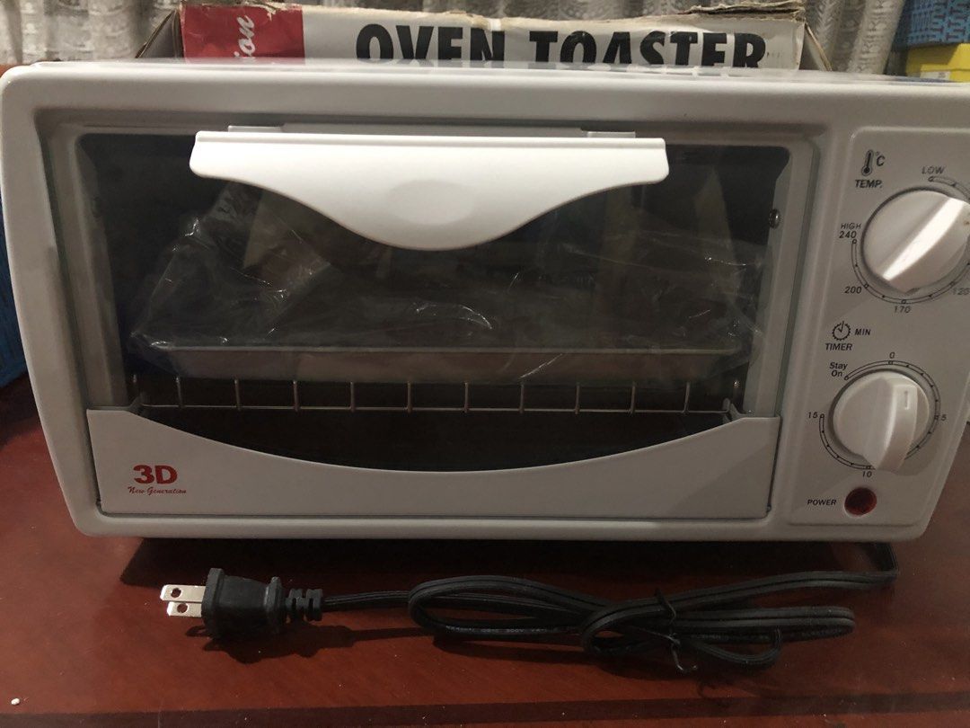 3D New Generation Oven Toaster White (Category: Ovens & Toasters) located in Paranaque City. Submitted by luxthings.etc. (Listing ID 1470922386, Image 1). Description: - Color/Model: White 3D New Generation oven toaster - Features: Adjustable temperature control knob, timer knob, and power indicator light - Included: Interior tray (still wrapped in plastic) and standard two-prong power plug - Packaging: Original box included - Design: Compact cou