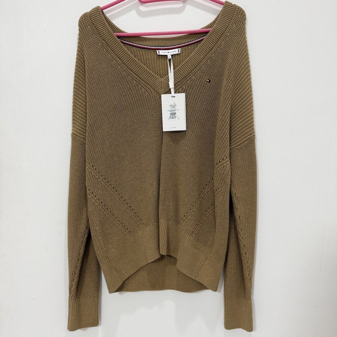 (42% OFF) BNWT Tommy Hilfiger Sweater (Category: Coats, Jackets and Outerwear) located in Paranaque City. Submitted by shopnani (Listing ID 1470840412, Image 1). Description: - Size: Medium (M) - Colorway: Countryside Khaki - Condition: Brand new with original store tags attached - Original Retail Price: ₱9,500 Perfect for autumn / fall / winter transition!.