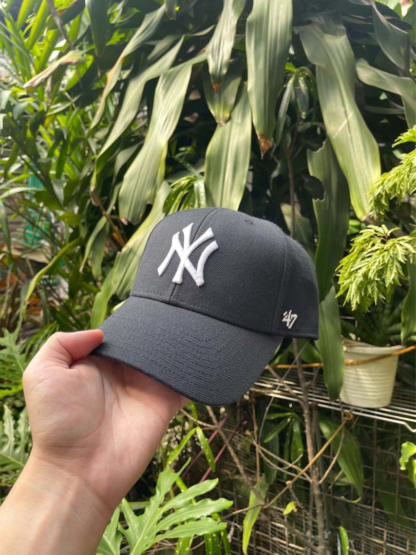 '47 New York Yankees Black Cap (Category: Caps & Hats) located in Pozorrubio. Submitted by kulin_ (Listing ID 1470893844, Image 1). Description: Authentic 47 brand New York Yankees baseball cap in black. White embroidered NY logo on the front, small '47 logo on the side. Adjustable strapback closure with Yankees script embroidery at the back. Clean interior lining with MLB hologram sticker on the brim. Classic everyday hat..