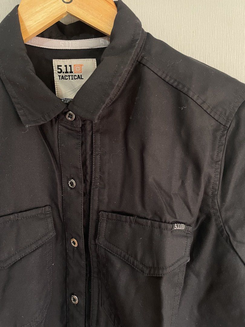 5.11 Tactical Black Button-Up Shirt Size Small (Category: Tshirts & Polo Shirts ) located in Mataasnakahoy. Submitted by zero4thrift (Listing ID 1470776313, Image 2). Description: - Brand: 5.11 Tactical - Style: Utility shirt / Long sleeve - Color: Solid black - Size: Men's Small (Regular Fit) - Material: 100% Tencel (soft and durable) - Features: Roll-up button tabs for sleeves, dual chest pockets with secure snap closure, button-down front and 