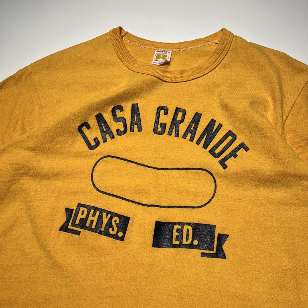 Vintage 70s Russell Athletic Collegiate Phys Ed. Tee (Category: Tshirts & Polo Shirts ) located in Balanga. Submitted by goodiegarments (Listing ID 1470843380, Image 3). Description: 70s Russell Athletic Collegiate Phys Ed. Tee Measurements: Length: 28 inches Shoulders: 19 inches Width (Pit to pit): 20 inches Bottom Hem: 20 inches Sleeve Length: 7 inches ₱2880.