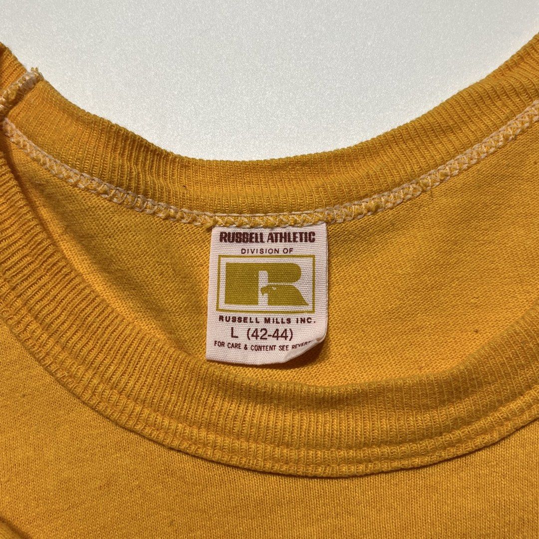 Vintage 70s Russell Athletic Collegiate Phys Ed. Tee (Category: Tshirts & Polo Shirts ) located in Balanga. Submitted by goodiegarments (Listing ID 1470843380, Image 2). Description: 70s Russell Athletic Collegiate Phys Ed. Tee Measurements: Length: 28 inches Shoulders: 19 inches Width (Pit to pit): 20 inches Bottom Hem: 20 inches Sleeve Length: 7 inches ₱2880.
