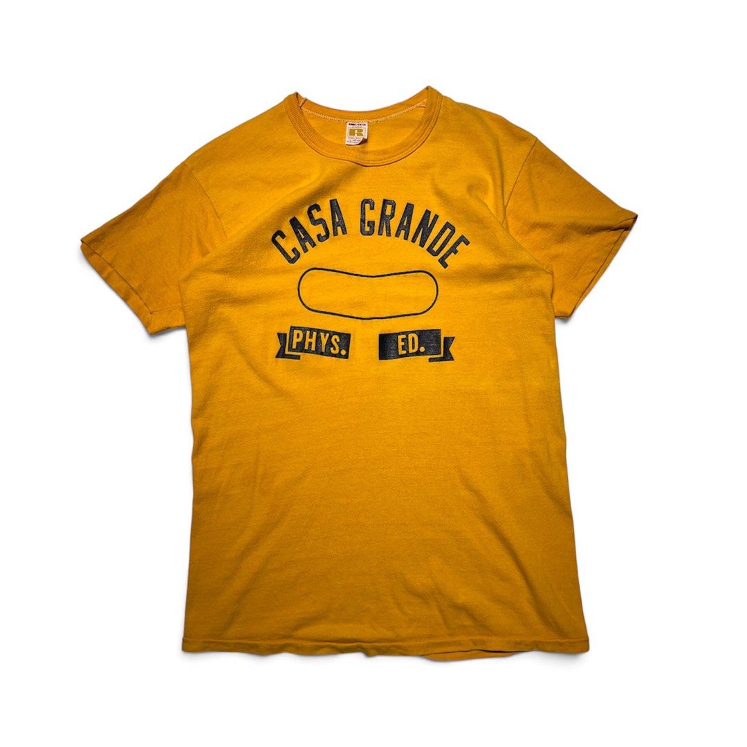 Vintage 70s Russell Athletic Collegiate Phys Ed. Tee (Category: Tshirts & Polo Shirts ) located in Balanga. Submitted by goodiegarments (Listing ID 1470843380, Image 1). Description: 70s Russell Athletic Collegiate Phys Ed. Tee Measurements: Length: 28 inches Shoulders: 19 inches Width (Pit to pit): 20 inches Bottom Hem: 20 inches Sleeve Length: 7 inches ₱2880.