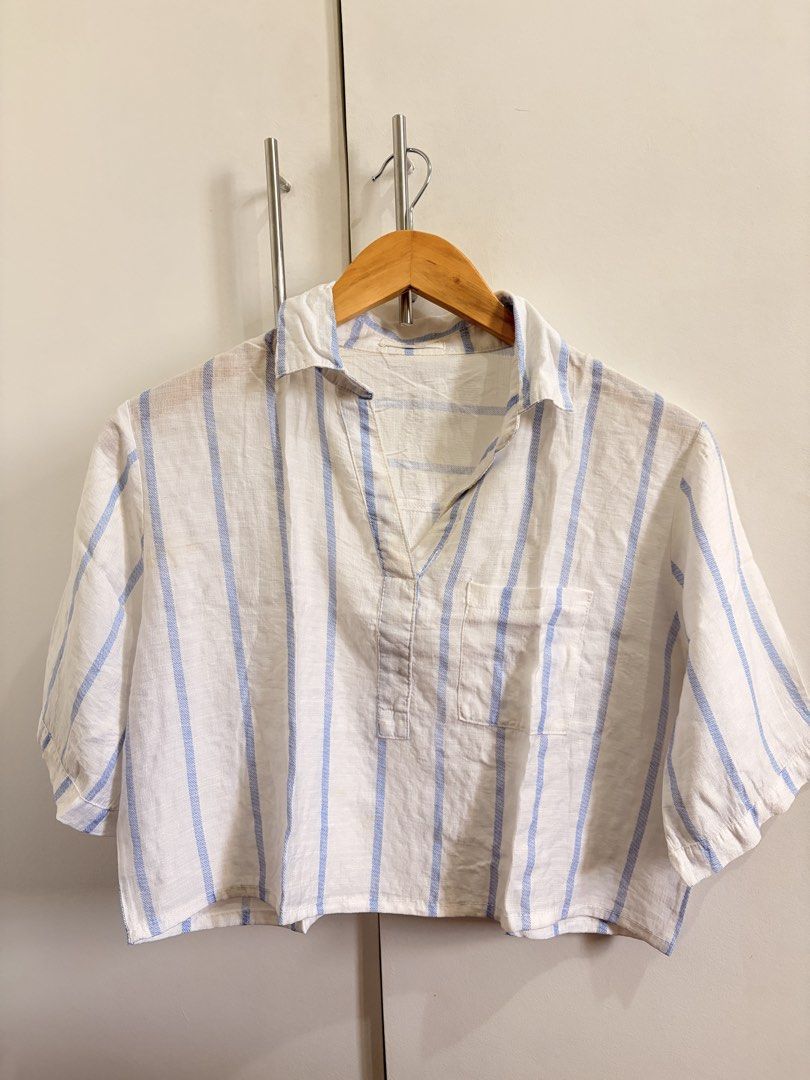 80.90 Blue White Striped Crop Blouse Size 10 (Category: Blouses) located in Marikina City. Submitted by _bananahanaa (Listing ID 1470768068, Image 1). Description: - Brand: 80.90 - Size: 10 (fits small-medium) - Design: White and blue stripes with v-neck and front chest pocket - Fit: Cropped and short-sleeved - Fabric: Lightweight and breezy .